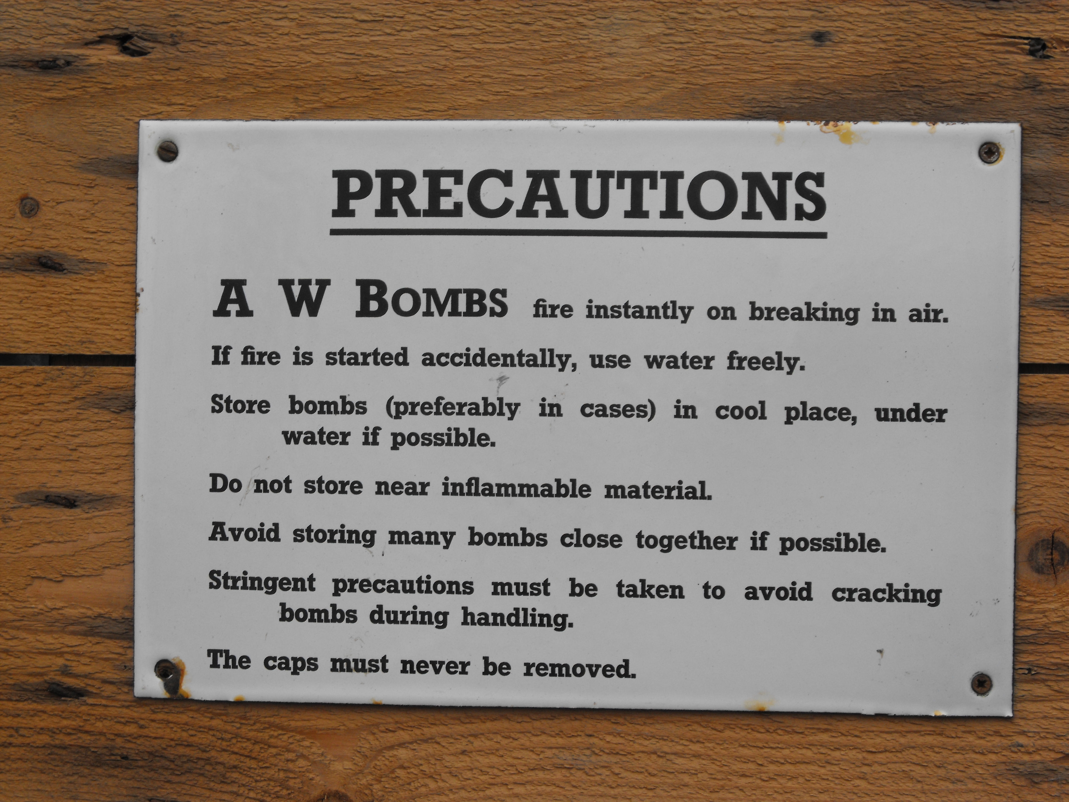 AW BOMB PRECAUTION SIGN